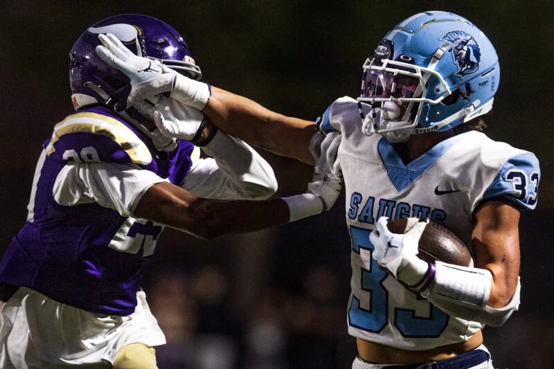 Valencia Vikings defender Jayboe Wilson (29) attempts to tackle Saugus Centurions running back Vinny Gallagher (33) in the first quarter of a Foothill League game between Saugus and Valencia High Schools at the Valencia High School football field on Friday, Sept. 16, 2022. Chris Torres/The Signal