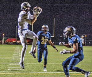 Photo Tom Cruze/For the Signal Saugus vs. West Ranch at Valencia. Saugus receiver Daniel Gilmartin comes down with a touchdown pass in the first half. 1014